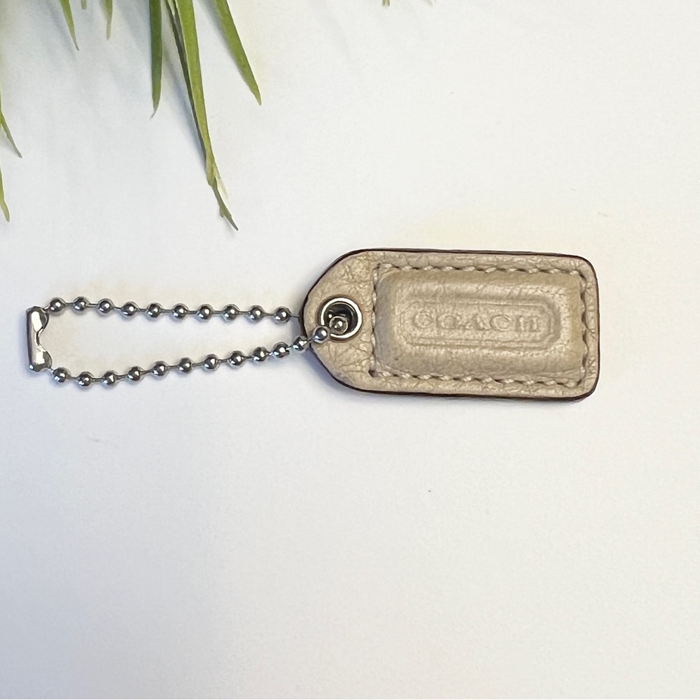 Small 1.5”COACH 
Beige Leather Hanging Tag Keychain FOB Bag Charm